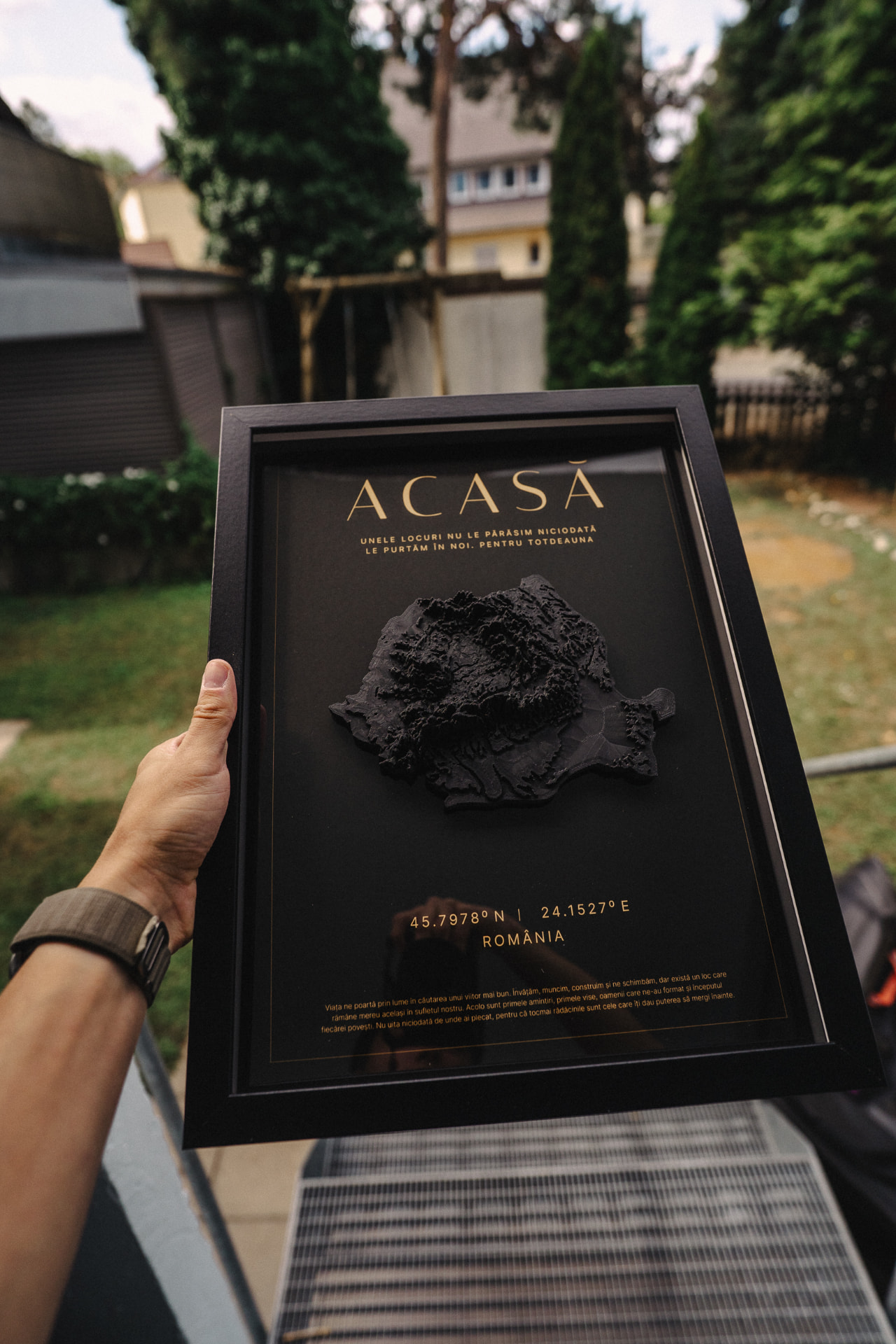 ACASĂ · 30 × 40 framed, held in daylight